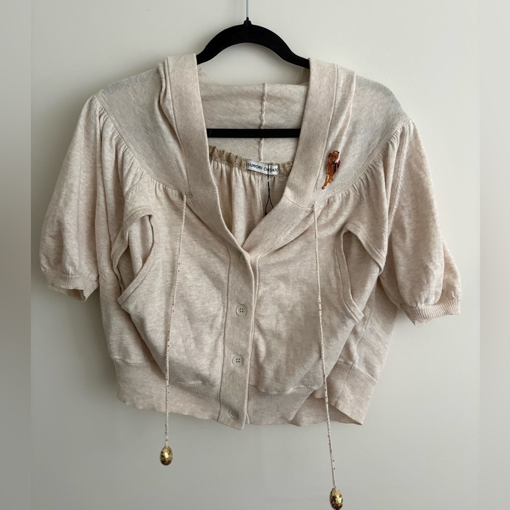 Tsumori Chisato cropped cream hooded vest/cardigan.